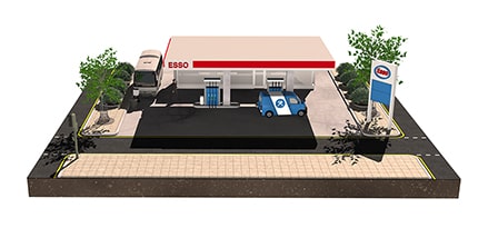 een model van een Esso-station met tuin